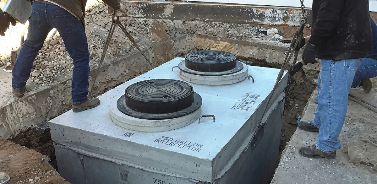 Grease trap installation for a commercial property drainage system in Buffalo, NY